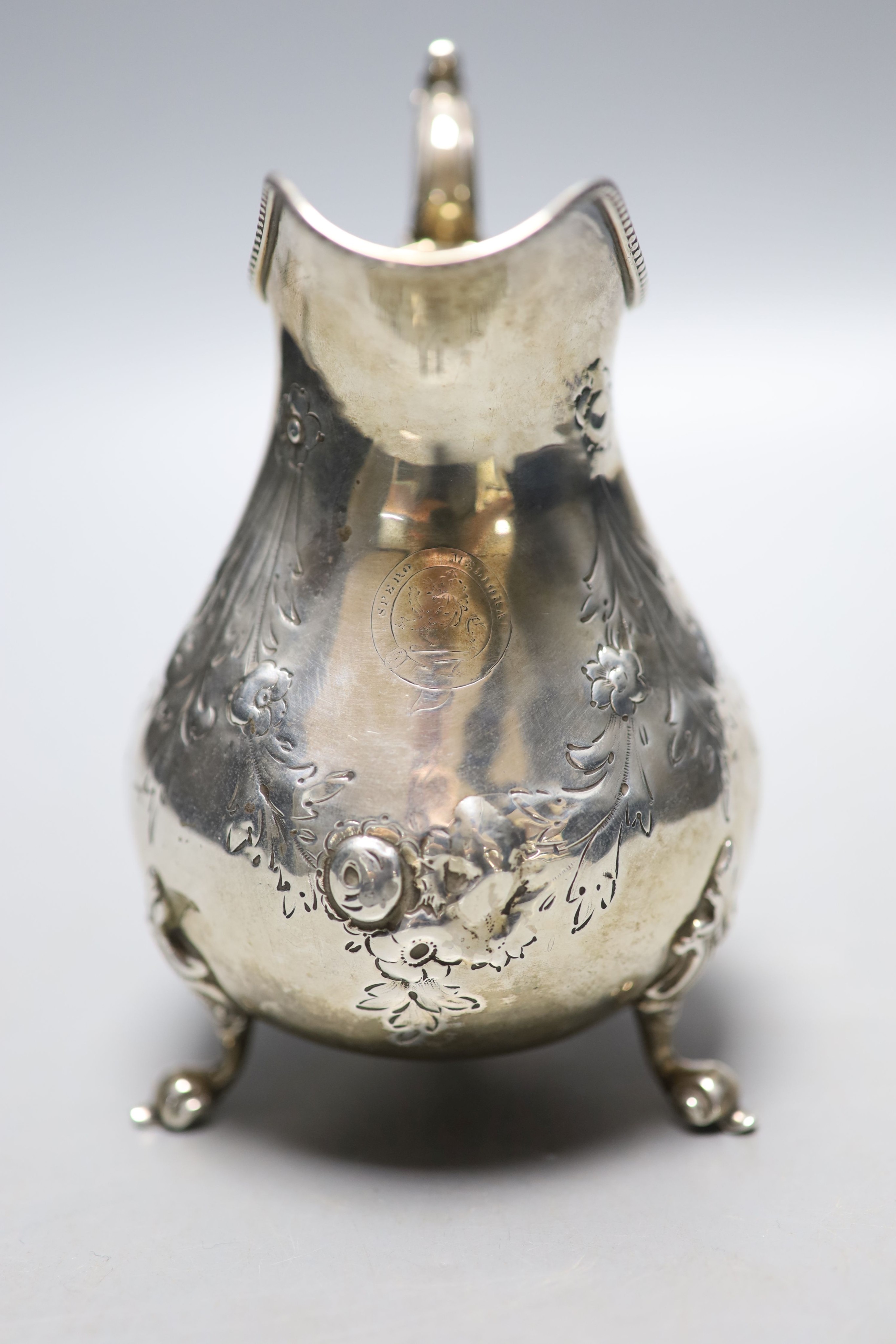 A Victorian silver baluster cream jug, London, 1860, height 13.8cm, 6oz.